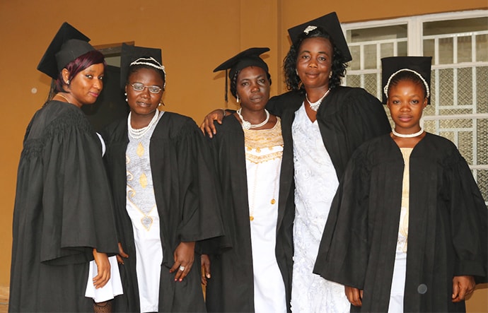 Five women graduated with tailoring skills from the Bo Women’s Training Center in Bo, Sierra Leone, in July. They are the first group to graduate from the new building, which was dedicated less than two years ago.  (From left)  Mbalu Kamara, Marian Ensah, Hawa Kallon, Haja Sowa and Janet Patrick. Photo by Phileas Jusu, UM News.