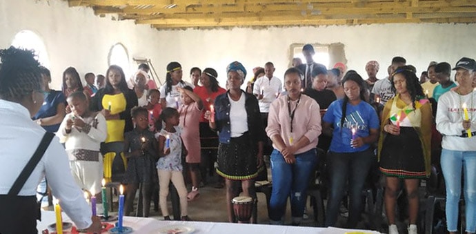 Deaconess Bulelwa Ndedwa, South Africa Conference youth director, educates girls and women in Notazana Village in Eastern Cape about the importance of proper hygiene during their menstrual cycles. Photo by Nandipha Mkwalo, UM News. 