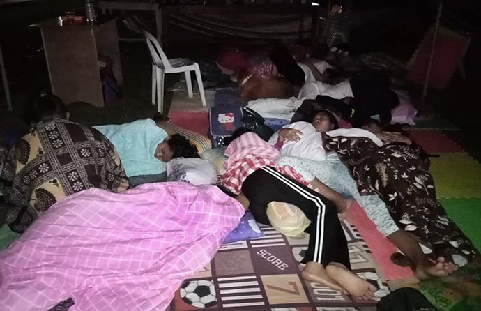 People affected by the recent earthquake in In Kidapawan City in Mindanao, Philippines, sleep outside in tents on the campus of Southern Philippines Methodist College. Photo by Rhea Jane Donisa.
