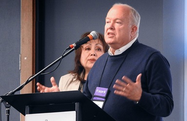 Bishop Michael McKee speaks during the United Methodist Council of Bishops meeting in Lake Junaluska, N.C., where the bishops learned that, at the current rate of giving, the bishops will run out of funds in 2024. McKee is president of the denomination’s General Council on Finance and Administration. With him at the podium is Bishop Minerva Carcaño. Photo by Sam Hodges, UM News. Bishop Michael McKee speaks during the United Methodist Council of Bishops meeting in Lake Junaluska, N.C., where the bishops learned that, at the current rate of giving, the bishops will run out of funds in 2024. McKee is president of the denomination’s General Council on Finance and Administration. With him at the podium is Bishop Minerva Carcaño. Photo by Sam Hodges, UM News.