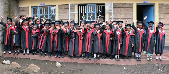 Students celebrate during graduation ceremonies at Dr. B.T. Cooper United Methodist School in Nairobi, Kenya. The majority of students at the school are Congolese children with refugee status. Photo by Gad Maiga, UM News.