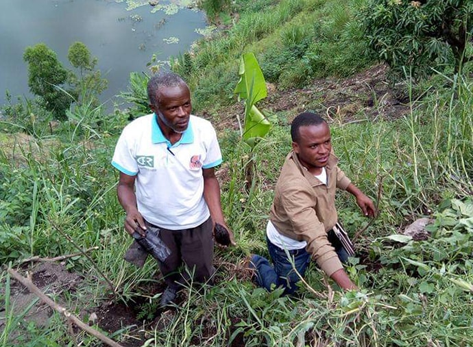 Agronomist Rachid Mutoro (right), a United Methodist in the Kivu Conference, helps a member of United Methodist Men tend to a new tree nursery the men have started in Goma, Congo. The men’s group is planning to transfer the trees to United Methodist church land in the region. Photo by Philippe Kituka Lolonga, UM News. 