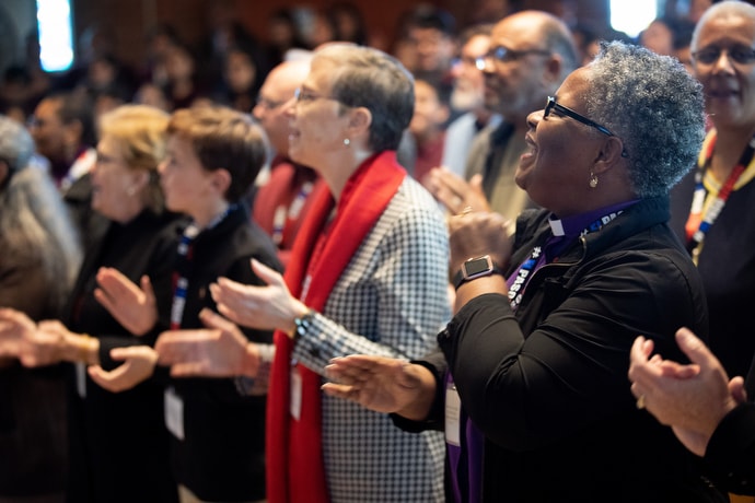 Bishop LaTrelle Easterling (right) sings alongside other members and guests of the United Methodist Immigration Task Force during worship service at the Lydia Patterson Institute in  El Paso, Texas. Photo by Mike DuBose, UM News.