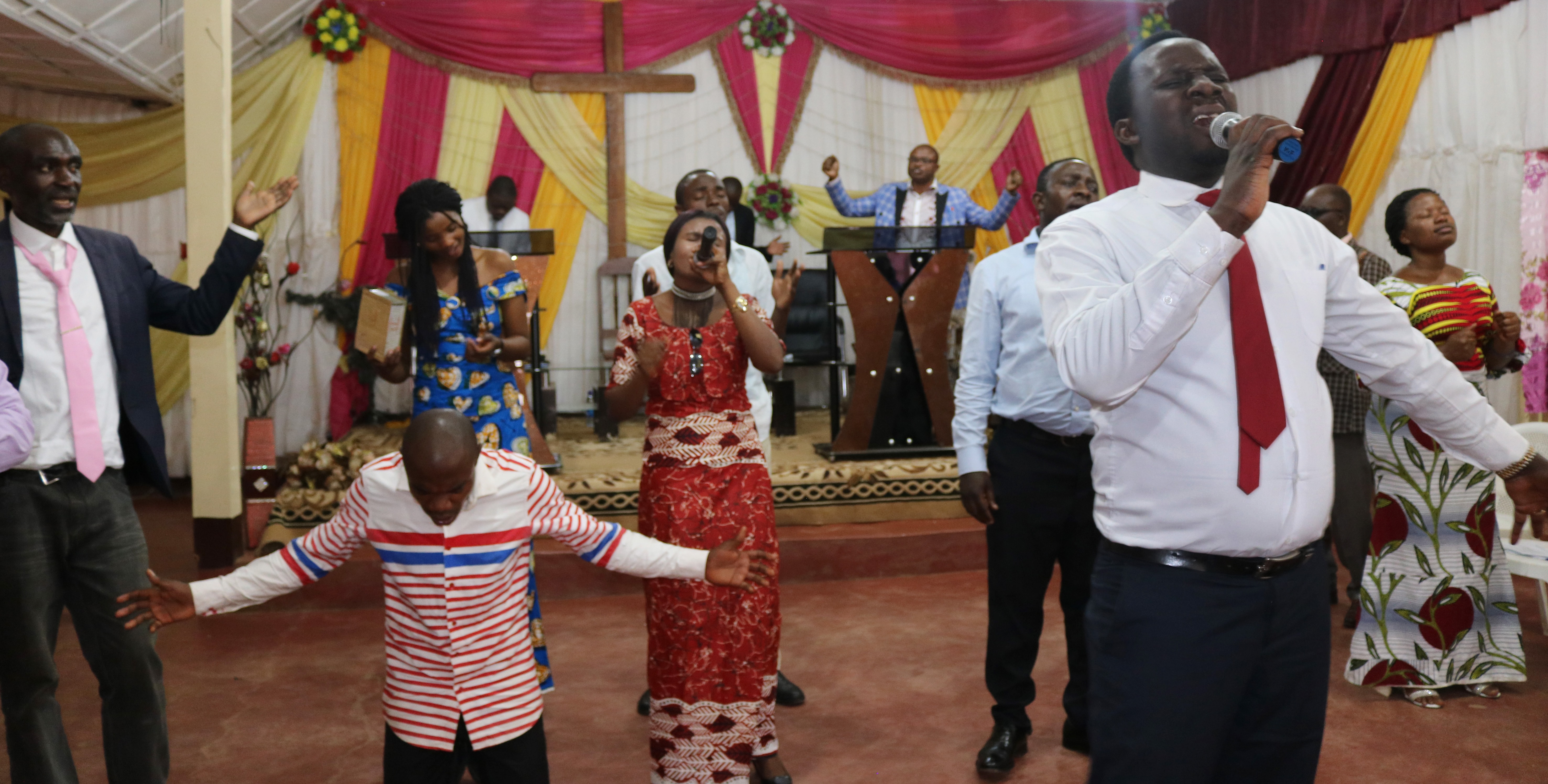 Congolese youth, including United Methodists, pray for peace, during an ecumenical Church of Christ in Congo gathering in Bukavu, Congo. Photo by Philippe Kituka Lolonga, UM News. 