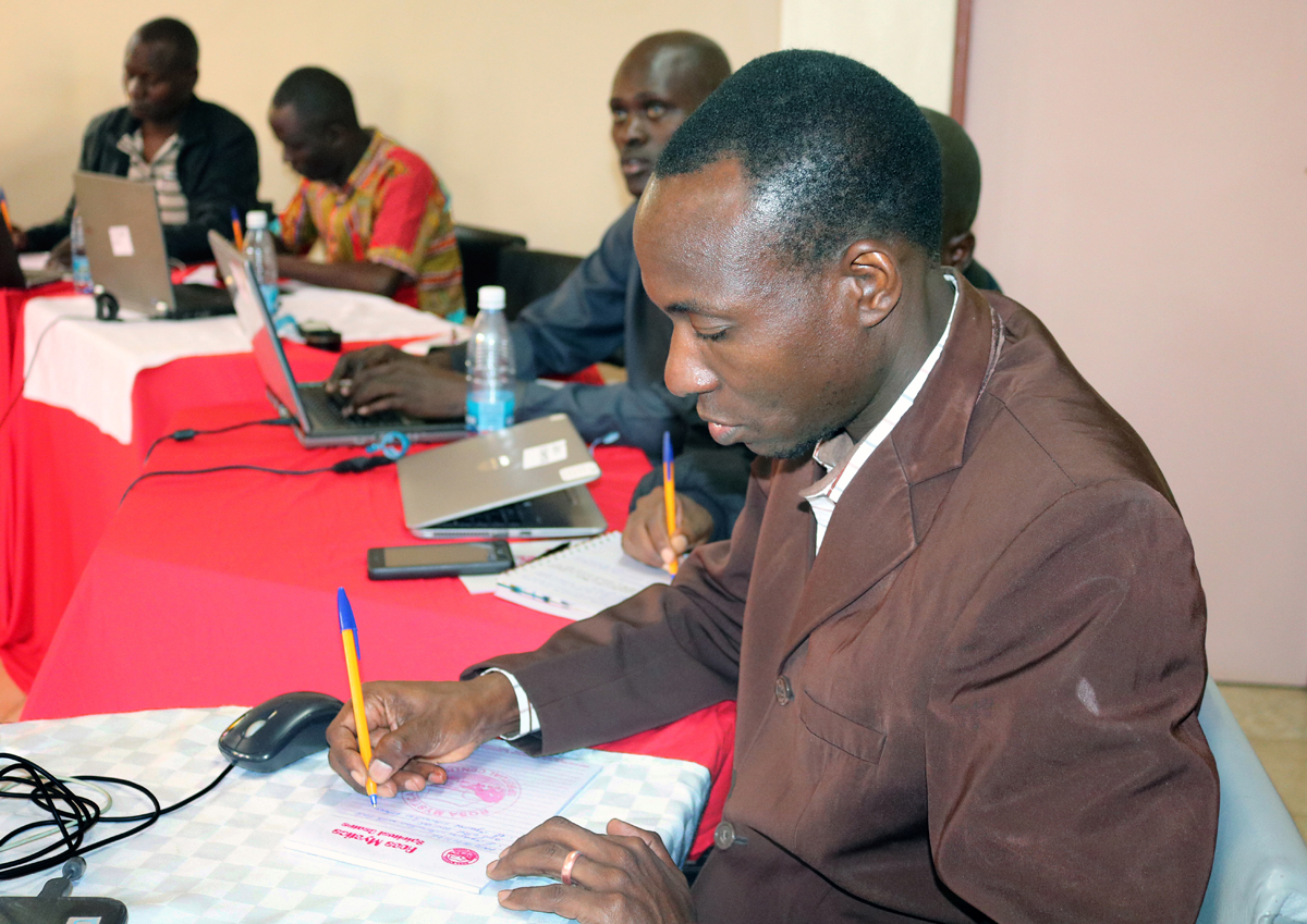 The Rev. Danson Maganga from Tanzania takes notes during a United Methodist e-Academy weeklong training session in Nairobi, Kenya. The goal of the new e-learning program is to equip people for ordained and lay leadership in rural communities. Photo by Gad Maiga, UM News.
