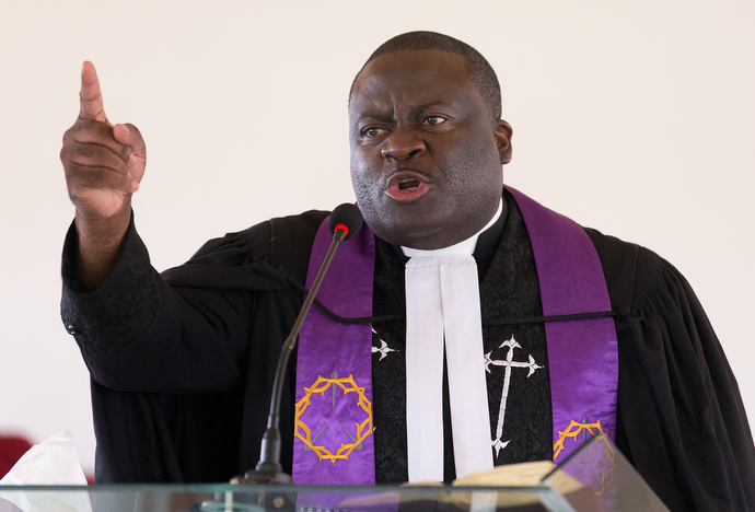 The Rev. Jean Claude Masuka Maleka gives the sermon during worship at Nazareth United Methodist Church in Abidjan. Photo by Mike DuBose, UMNS.