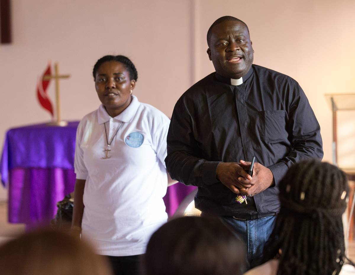 United Methodist missionaries Francine Mpanga Mufuk (left) and the Rev. Jean Claude Masuka Maleka lead a Bible study at Nazareth United Methodist Church in Abidjan, Côte d'Ivoire. The married couple are both from the Democratic Republic of Congo.