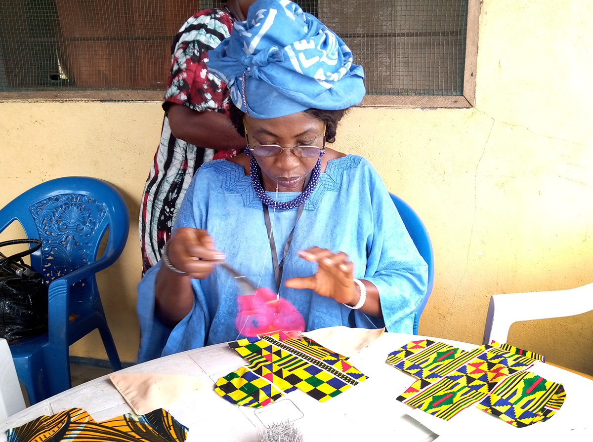 A member of United Methodist Women learns to make cloth menstrual pads at the group’s annual gathering in Camphor Mission, Liberia. The women have launched a new program to make reusable sanitary pads locally, so that girls from rural areas don’t have to miss school during their menstrual cycles. Photo by Michael Boegley, The United Methodist Church in Liberia communications department. 
