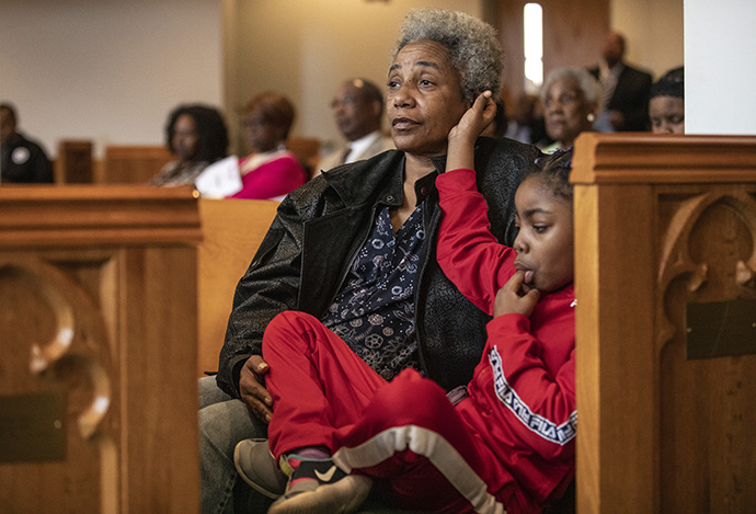 Renee Featherston from Braden Memorial United Methodist Church attends worship with her great-great niece, 6-year-old Caliyah Crenshaw, at Gordon Memorial United Methodist Church in Nashville, Tenn. The churches worshiped together at Gordon on the Sunday following the March 3 tornado that heavily damaged the Braden Memorial. Photo by Kathleen Barry, UM News.