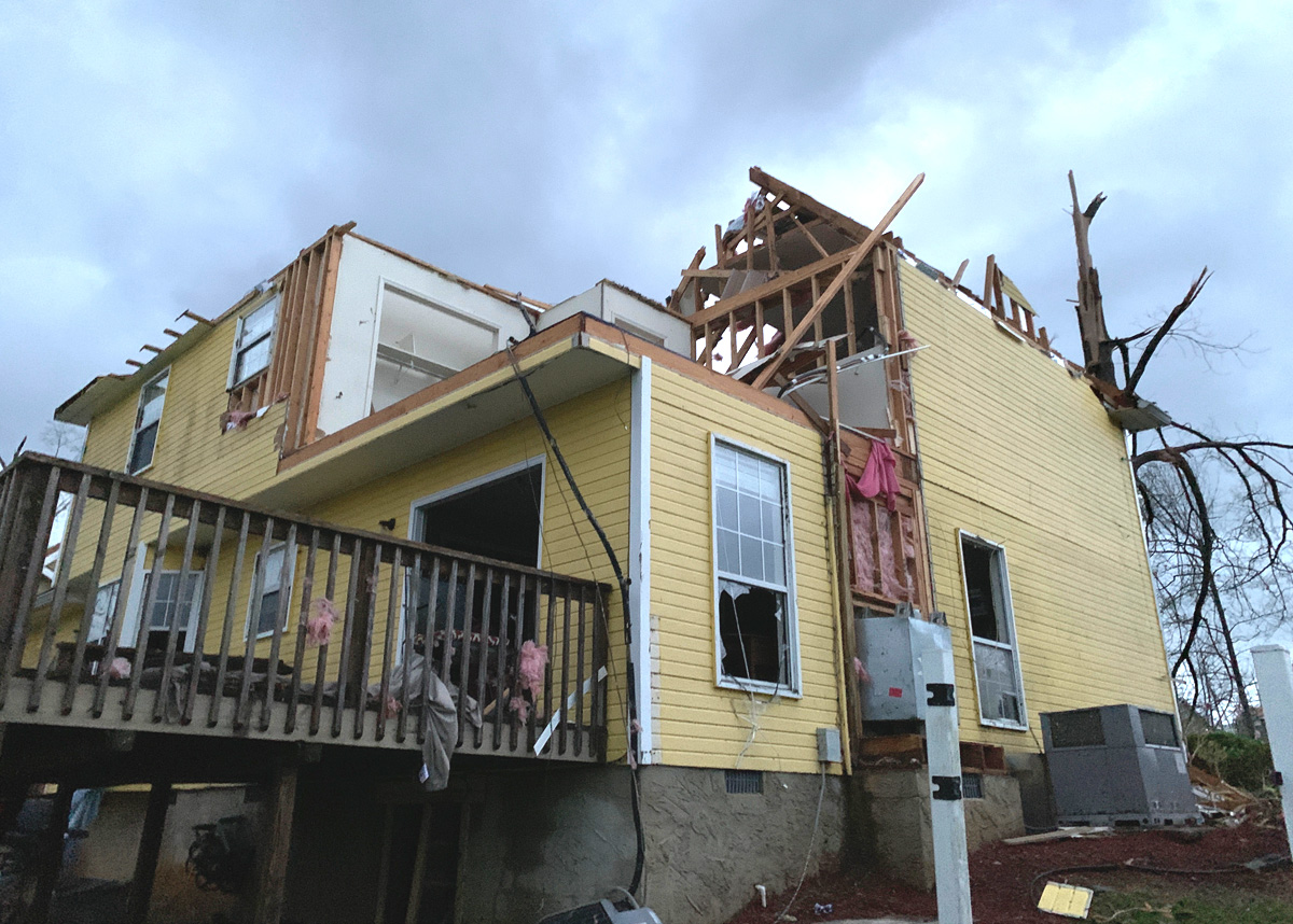 The Farleys, members of First-Centenary United Methodist Church in Chattanooga, Tenn., posted “messages of distress” to their Facebook page after severe storms devastated their home on April 12. Troy Hamilton, youth pastor at the church, drove and then walked to reach them: "It was glorious to have a familiar friendly face show up.” Photo by Troy Hamilton. The Farleys, members of First-Centenary United Methodist Church in Chattanooga, Tenn., posted “messages of distress” to their Facebook page after severe storms devastated their home on April 12. Troy Hamilton, youth pastor at the church, drove and then walked to reach them: "It was glorious to have a familiar friendly face show up.” Photo by Troy Hamilton.