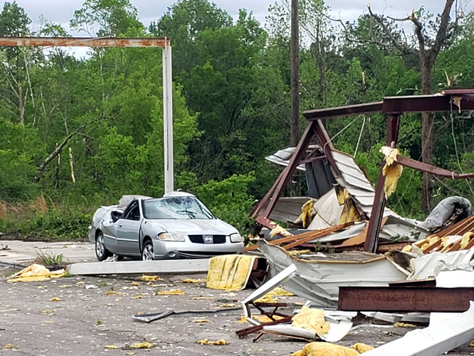 The remains of a structure and a car in Sumiton, Ala., bear witness to the devastation wreaked by a line of storms that traveled across the southern U.S. April 12. Photo by the Rev Billy Weems, Aldersgate United Methodist Church.