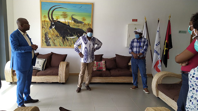 The Rev. Manuel Andre, an administrator at Methodist University of Angola and a representative of Bishop Gaspar Domingos, welcomes members of the government to the Cacuaco campus. Photo by Orlando da Cruz, UM News.