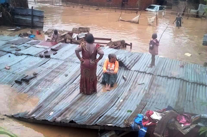 Chantal Bwanga, president of United Methodist Women in Uvira, Congo, was forced to climb onto a roof to escape the flooding. Photo courtesy of Dr. Claude Watukalusu. 