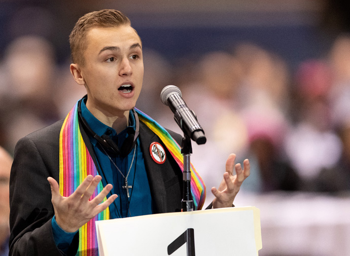 Jeffrey “J.J.” Warren of the Upper New York Conference speaks in favor of full inclusion for LGBTQ people in the life of The United Methodist Church during the 2019 United Methodist General Conference in St. Louis. He joined other young adult delegates in writing and circulating a petition calling for the postponed General Conference not to be at the start of the school year. File photo by Mike DuBose, UM News.