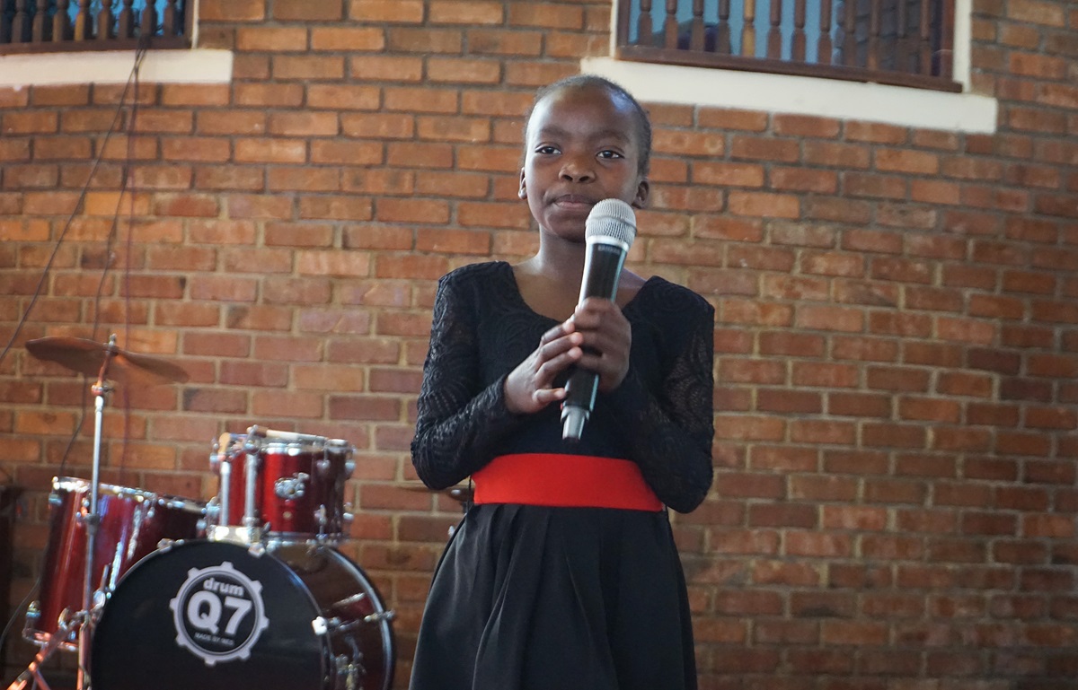Ten-year-old Britney Sadete performs at Cranborne United Methodist Church in Harare, Zimbabwe, during The UMC’s Got Talent, an annual Zimbabwe Episcopal Area talent show, on July 28, 2019. Britney, who took first place in the under-12 category and second place overall, recently released her first album. Photo by Kudzai Chingwe, UM News. 