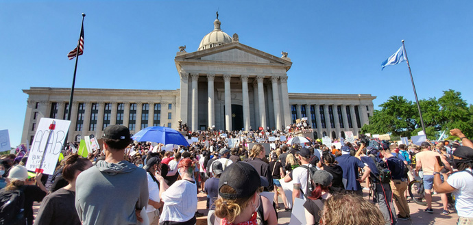 A crowd of protesters gathers outside the capitol building in Oklahoma City, Okla., May 31 for the Demand Justice Rally organized by Black Lives Matter and other organizations in protest of the death of George Floyd, an unarmed African America man in Minneapolis, Minn., and other killings of African Americans by police. The 99th anniversary of the Tulsa Race Massacre was on May 31. Photo by Meagan Ewton, courtesy of the Oklahoma Conference.