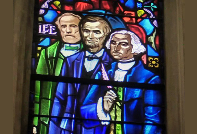 A stained-glass window in The Cathedral of the Rockies/Boise First United Methodist Church, in Boise, Idaho, features images of Robert E. Lee (left), Abraham Lincoln and George Washington. Church leaders have decided to remove the image of Lee, given his role as a Confederate general. “Symbols of white supremacy do not belong in our sacred space,” they said in a statement. Photo courtesy of The Cathedral of the Rockies.