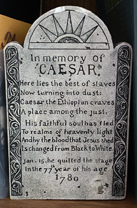 A replica of an 1780 grave marker in Attleboro, Mass., proclaims that a deceased slave named Caesar will be "changed from Black to White" in heaven. The Rev. Alfred T. Day III, top executive of the United Methodist Commission on Archives and History, said the gravestone reflected the white supremacist attitudes of the time. Photo courtesy of the Rev. Fred Day III.