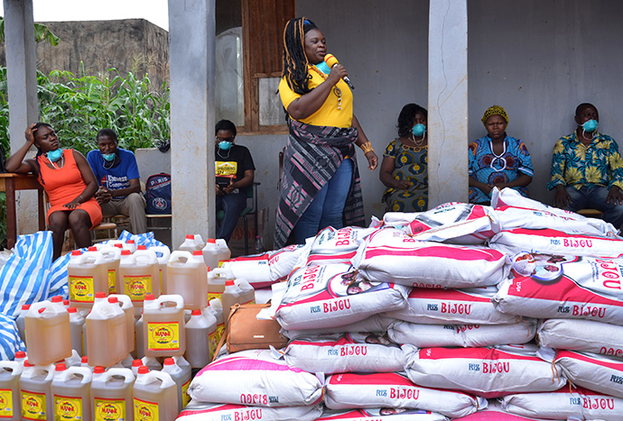 Ntube Beatrice Diffang, coordinator for the United Methodist Women Association in Cameroon, oversees the distribution of food and other items to displaced people at Ebenezer Community United Methodist Church in Yaounde, Cameroon. The church in Cameroon received a $7,320 Sheltering in Love grant from the UMCOR COVID-19 Relief Fund. Photo courtesy Vischo Image.