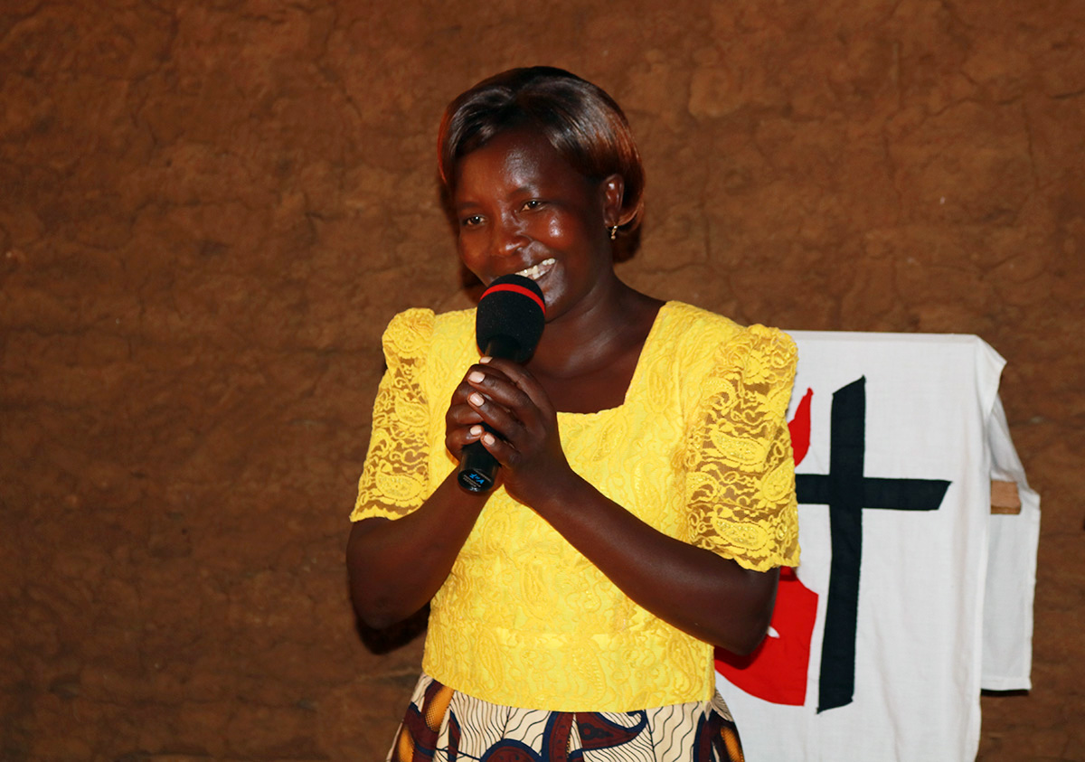 The Rev. Rosemary Iseren, pastor of Dirakho United Methodist Church in Busia, Kenya, is preaching to her congregants in their homes and rural villages during the coronavirus pandemic. She dubbed the outreach “D2D,” and other pastors in the region have followed her lead. Photo by Gad Maiga, UM News. 