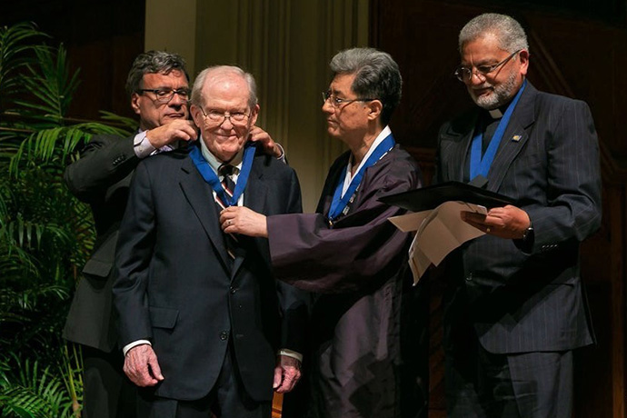 On November 21, 2019, at the 2019 World Methodist Peace Award Ceremony held at Grace United Methodist Church in Atlanta, Thomas Kemper, General Secretary of the Global Ministries (left) conferred the 2019 World Methodist Peace Award Medal to the Rev. James Laney. The Rev. Jong-Chun Park, president of the World Methodist Council and one of Laney’s students, assists. Ivan Abrahams (right), General Secretary of the World Methodist Council stands by. Photo courtesy of Cindy Brown, Global Ministries.