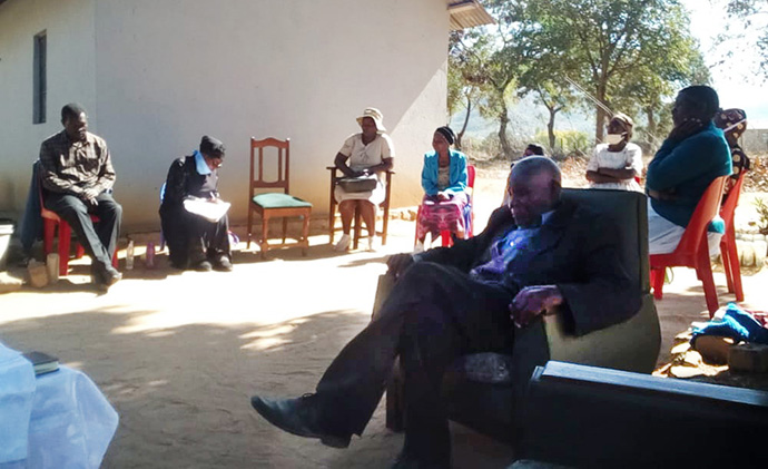 Mundenda United Methodist Church in the Mutasa Nyanga District of Zimbabwe holds small classes outdoors during the COVID-19 pandemic to social distance and avoid the need for sanitizing the sanctuary, which can be costly. Photo by Kudzai Chingwe, UM News.