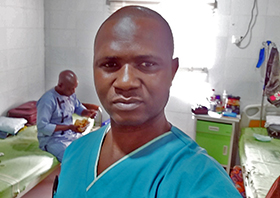 Elisha Friday Ishaya, a perioperative nurse, takes a selfie while in quarantine at the Federal Medical’s Isolation Treatment Center in Keffi, Nigeria. The Africa University graduate was one of 17 on a 50-member medical team who tested positive for COVID-19. Photo courtesy of Africa University.  
