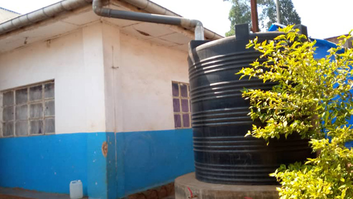 A new water tank holds water reserves at United Methodist Irambo Hospital in Bukavu, Congo. The tank was installed to collect rainwater to use at the health center. “(The tanks) sometimes allow us to conserve water, especially during this dry season when water has become a scarce commodity in the city of Bukavu,” said Dr. Djimmy Kasongo, medical director at the hospital. Photo courtesy of United Methodist Irambo Hospital.