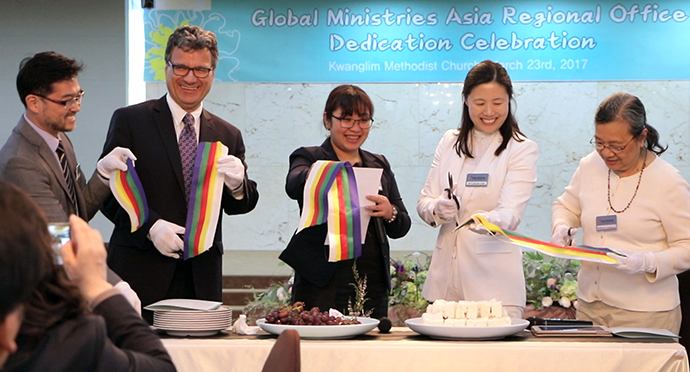 The Rev. Paul Kong, Thomas Kemper, Joy Eva Bohol, the Rev. Myungim Kim and Rebecca Asedillo cut the ribbon signifying the opening of the Asia Regional Office in Seoul, South Korea, in March 2017. File photo by Jennifer Silver, Global Ministries.