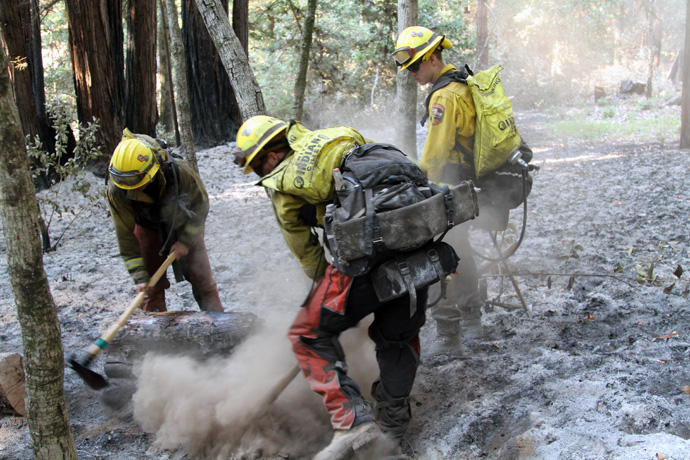 U.S. Army soldiers from the California Army National Guard’s Task Force Rattlesnake out of Redding, Calif., put out a fire Sept. 1, near Scott’s Valley during the CZU  Lightning Complex Fire in Santa Cruz and San Mateo counties. Photo by Staff Sgt. Eddie Siguenza, U.S. Army National Guard.