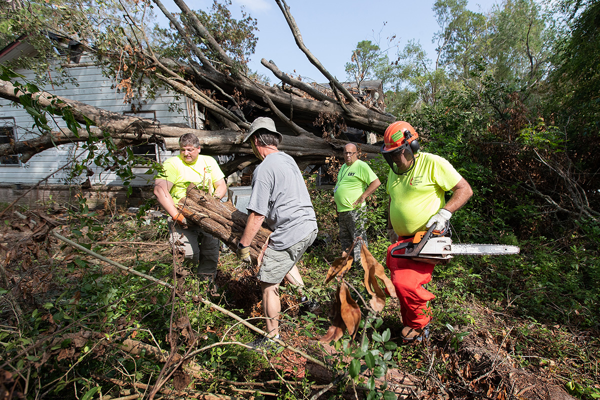 United Methodist volunteers work to remove a fallen tree from a home in DeRidder, La., in September after Hurricane Laura swept through the area. United Methodists along the Gulf Coast are responding to Hurricane Zeta, the 11th named storm to hit the U.S. so far this year. File photo by Mike DuBose, UM News.