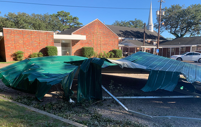A metal roof lies outside Crawford United Methodist Church in Mobile, Ala., after it was blown across the highway by Hurricane Zeta. Photo courtesy of the Rev. Michele Statkewicz.