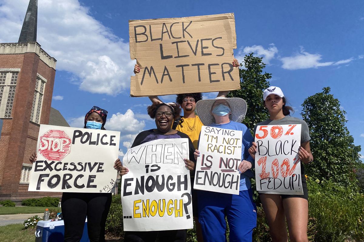Derian Wilson, a member of Martha Bowman United Methodist Church in Macon, Ga., protests against racism regularly in that city. Wilson (at top in yellow shirt) and fellow activists during one of the three or four protests he leads each week. Photo courtesy of Derian Wilson.