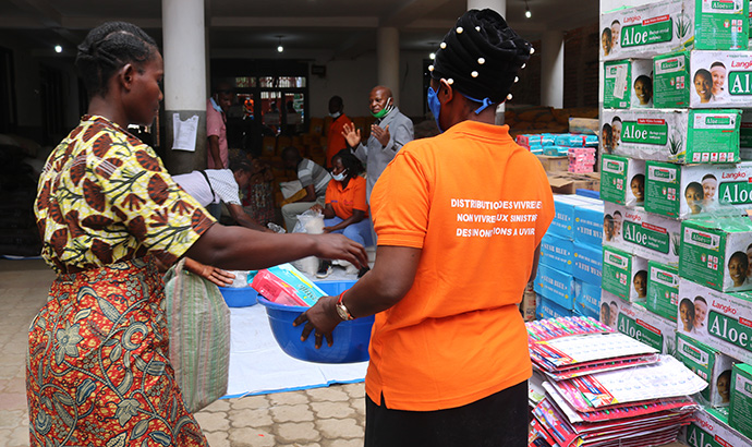 Ana Nyasile, who lost her husband during the recent floods in Uvira, Congo, receives food and other assistance from The United Methodist Church in East Congo through a grant from the United Methodist Committee on Relief. Photo by Philippe Kituka Lolonga, UM News.