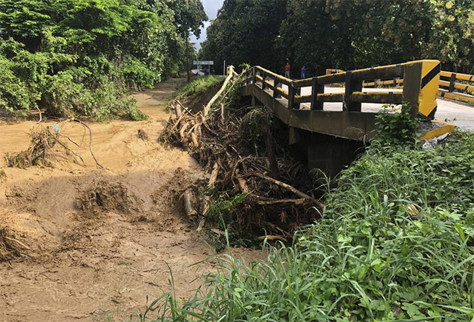 According to government authorities, Hurricane Eta severely affected Honduras' road infrastructure, leaving 21 bridges destroyed, like this one in Río Lindo, and more than 100 roads damaged. Photo courtesy of the United Methodist Mission of Honduras.