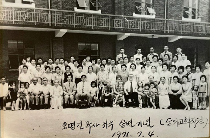 The Rev. George E. Ogle (center) in an archived July 4, 1971 photo in front of the Soongeui Methodist Church in Incheon, Korea, where he was a clergy member. Next to Ogle is the Rev. Ho-moon Lee (elected as a bishop of the Korean Methodist Church.)  File photo courtesy of Soongeui Methodist Church in Incheon, Korea.