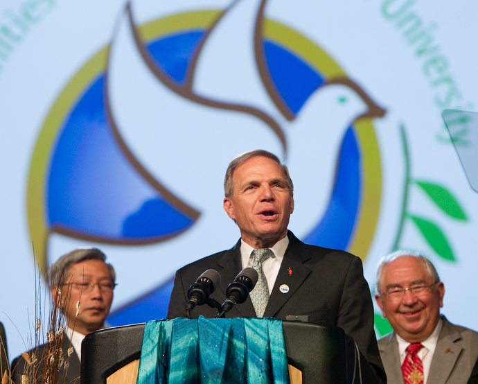 Bishop John R. Schol (center) helps recognize the Community of Shalom program during the 2012 United Methodist General Conference in Tampa, Fla. As a pastor and a director for the United Methodist Board of Global Ministries, Schol was present at the 1992 General Conference when the body stopped the planned business and took a day out for prayer, fasting and conversation over the sin of racism. File photo by Mike DuBose, UM News.