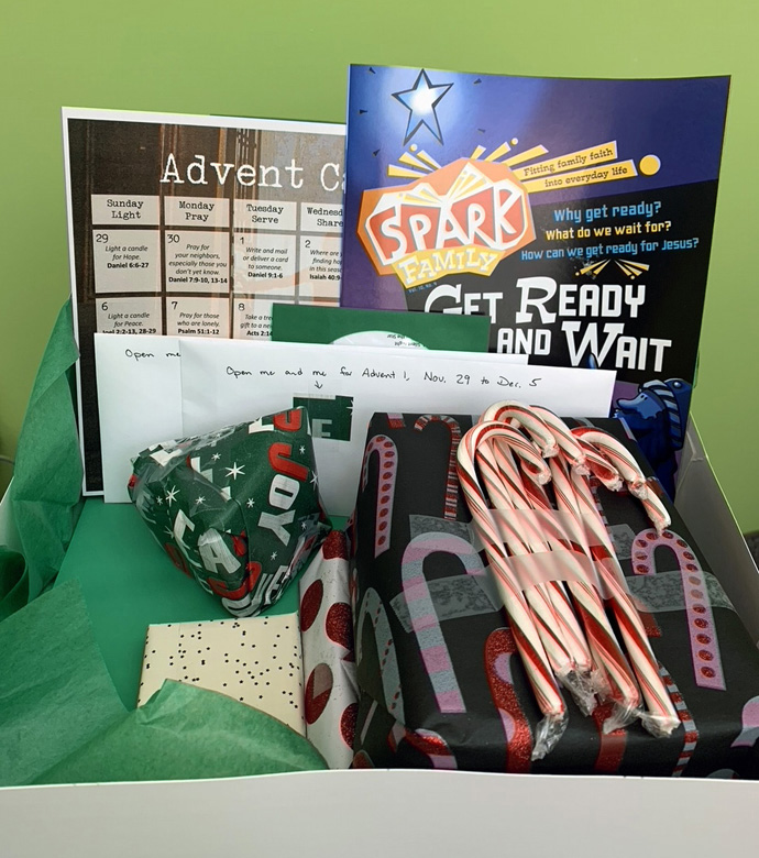 An Advent activity box created by Centennial United Methodist Church in Minnesota features goodies such as a Christmas CD and a Spark Family magazine for children, and activities including ornaments, prayers and an Advent wreath. Photo courtesy of the Rev. Jennifer Anderson, Centennial United Methodist Church.