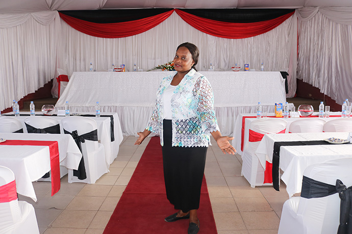 Charity Njagu, an events manager and member of St. Paul United Methodist Church in Harare, Zimbabwe, offers her resources, time and expertise in arranging decorations for church events free of charge. Photo by Priscilla Muzerengwa, UM News.