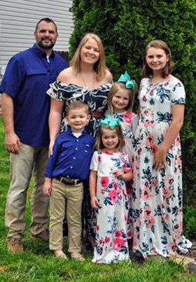 Chris (left) and Lindsey Whitley and their children get a meal once a week from their church, Mill Grove United Methodist Church in Indian Trail, N.C. Photo courtesy of Lindsey Whitley.