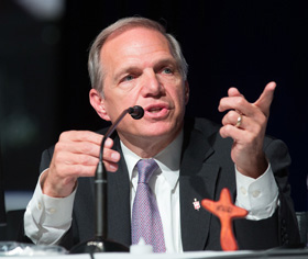 Bishop John R. Schol presides over the closing business session of the 2016 United Methodist General Conference in Portland, Ore. File photo by Mike DuBose, UM News.