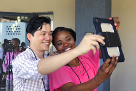 Danny Mai (left) with Irene Kashala Tsheleka from the Democratic Republic of Congo during a 2017 training session for communicators in Ndola, Zambia, conducted by United Methodist Communications. File photo by Kathleen Barry, United Methodist Communications.