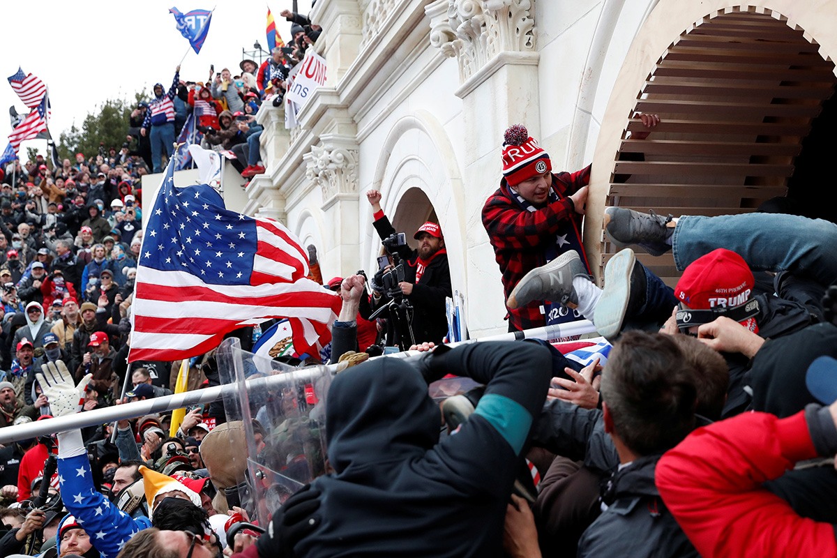 Supporters of President Donald Trump storm into the U.S. Capitol in Washington after clashing with police to protest the certification of the 2020 U.S. presidential election results by Congress on Jan. 6. Photo by Shannon Stapleton, REUTERS.