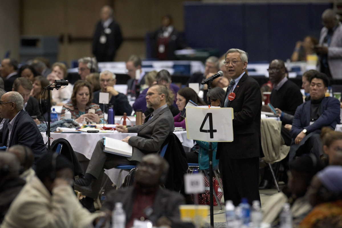 The Rev. Kah-Jin Jeffrey Kuan, a General Conference delegate from the California-Nevada Conference, speaks during the last day of the 2019 special General Conference in St. Louis. The Commission on the General Conference met online in December to discuss planning for the General Conference postponed by COVID-19. File photo by Paul Jeffrey, UM News.