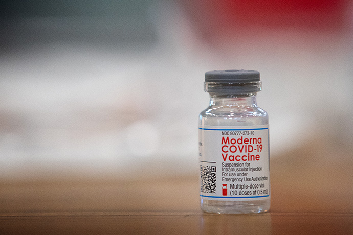 A vial of the Moderna COVD-19 vaccine rests on a preparation table at Community United Methodist Church in Vincennes, Ind. The church opened the doors of its recreational center to host a vaccination site for Knox County, Ind. Photo by Mike DuBose, UM News.