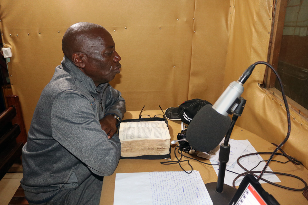 The Rev. Clement Kingombe Lutala, Bukavu District superintendent, shares COVID-19 prevention information on Radio Iriba in Bukavu. With the help of the United Front Against Riverblindness, The United Methodist Church in East Congo has led awareness campaigns via community radio in 10 health zones in North and South Kivu. Photo By Philippe Kituka Lolonga, UM News.