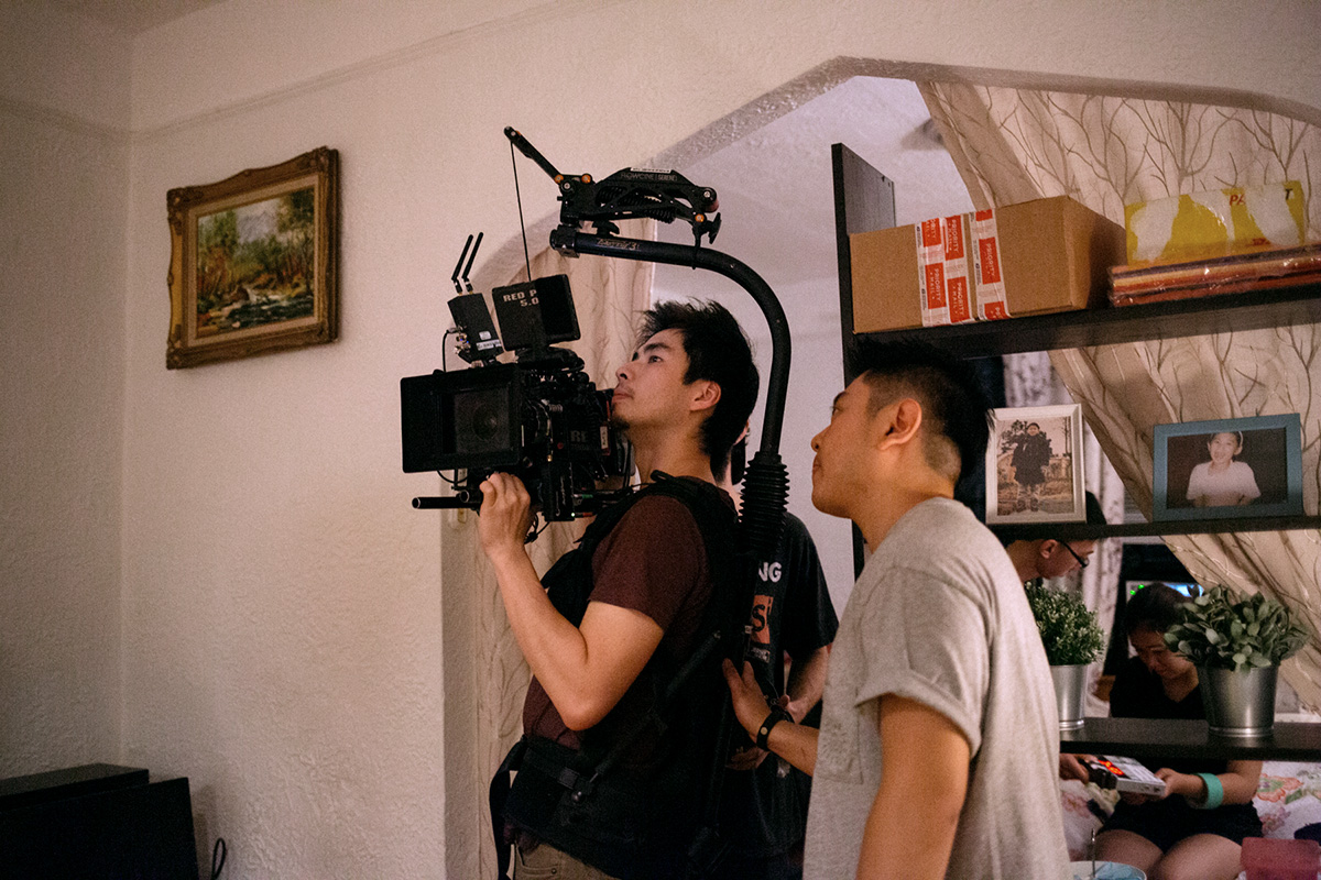Gordon Yu (left) and Julian Kim record a scene for the film “Happy Cleaners,” which examines the lives of working-class Korean Americans. Photo by Janice Chung.
