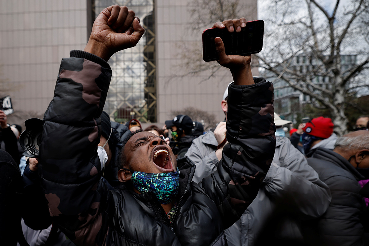 A person reacts outside the Hennepin County Government Center in Minneapolis after the guilty verdict handed down April 20 in the trial of former Minneapolis police officer Derek Chauvin for the murder of George Floyd. While expressing the sense that the verdict was just, United Methodist leaders urged continuing work toward dismantling widespread racism and systemic injustice against people of color. Photo by Carlos Barria, Reuters.