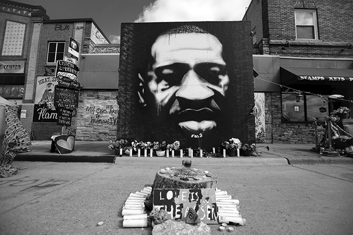 A portrait of George Floyd by artist Peyton Scott Russell forms part of a memorial to Floyd in Minneapolis. Former Minneapolis police officer Derek Chauvin was convicted April 20 for murdering Floyd. Photo by Lorie Shaull.