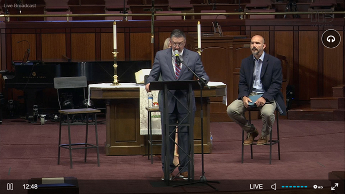 During an April 26 press conference given by Mt. Bethel United Methodist Church, Jody Ray surrenders his clergy credentials in response to being reassigned by Bishop Sue Haupert-Johnson. Church leaders also announced the congregation is beginning the process of disaffiliating from The United Methodist Church. Screenshot of livestream courtesy of Mt. Bethel United Methodist Church. 